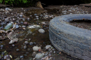 car tire in stream