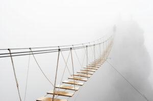 rope bridge in fog