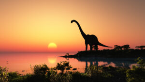 dinosaur at sunset